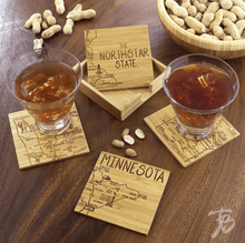 Load image into Gallery viewer, Totally Bamboo Minnesota State Puzzle 4 Piece Bamboo Coaster Set with Case